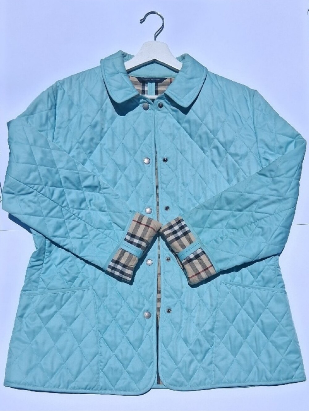 Burberry Light Blue Quilted Jacket with Check Cuff Detail